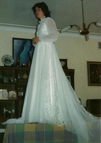 Fitting daughter-in-law with her wedding gown